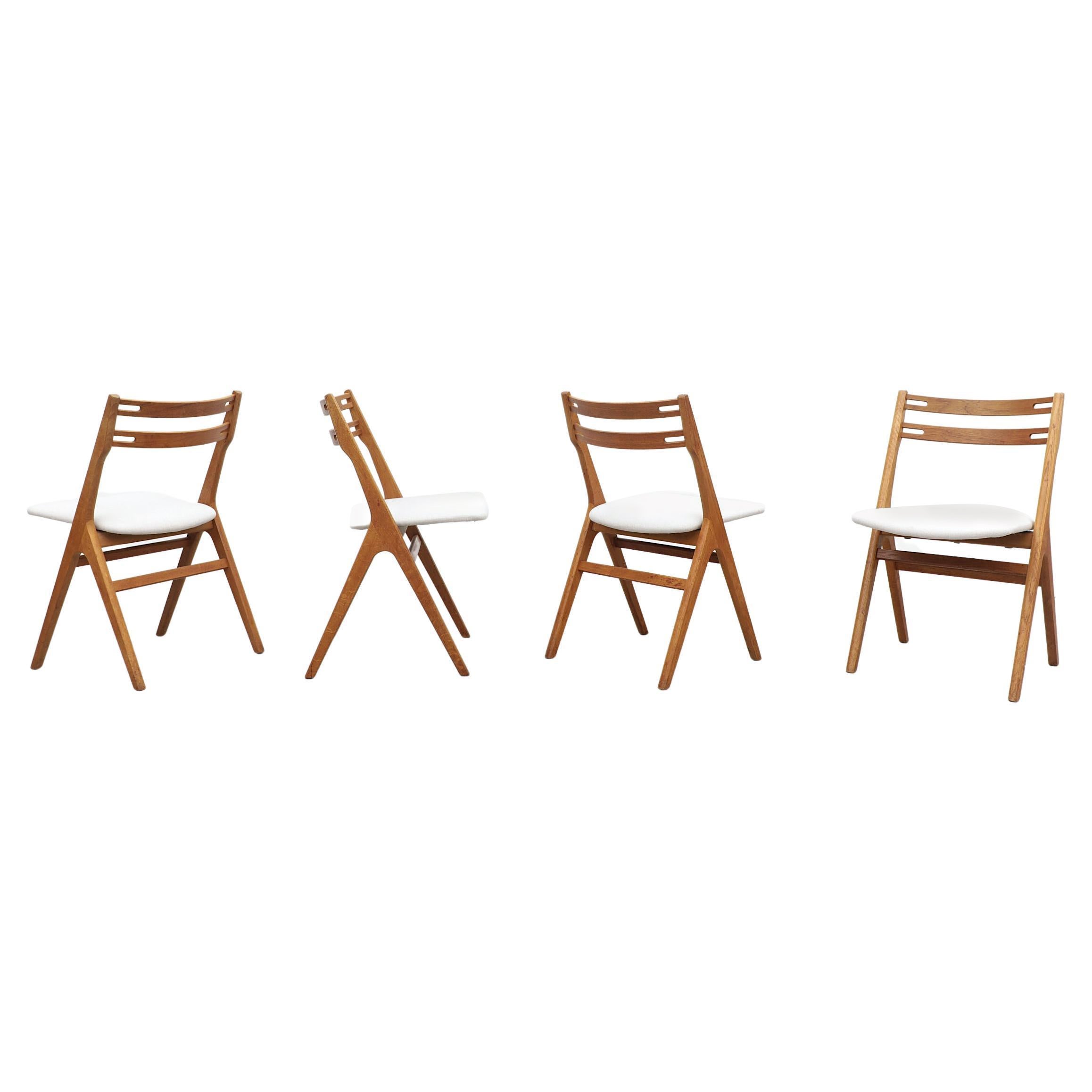 Set of 4 Hans Wegner Inspired Oak Dining Chairs by Sibast with White Seats For Sale