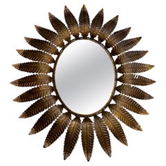 Spanish Oval Gilt Metal Sunburst Mirror with Dark Gilt Finish