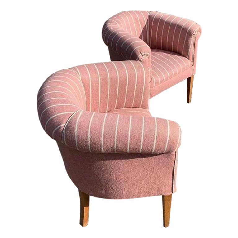 Two Pink Lounge Chairs from the 1950s