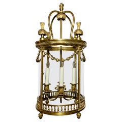 Lanterne française ancienne Louis XVI à 4 feux en bronze doré, vers 1880.