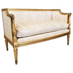 Antique French Directoire Styled Settee with Hand-Carved Giltwood Accents