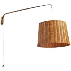 Lampada da parete regolabile di design italiano, ottone, rattan, Italia, anni '40