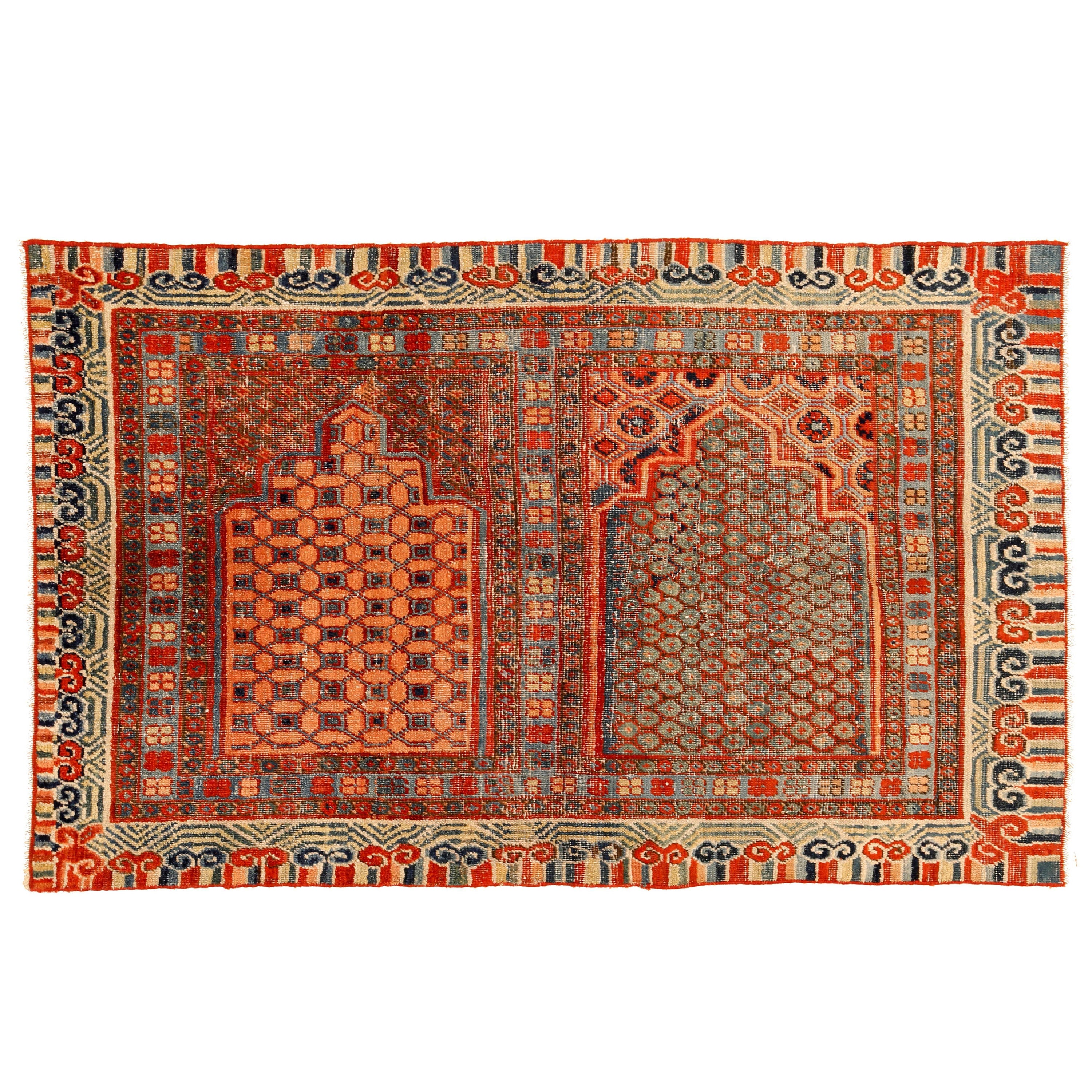 Rare and Early Khotan Rug with Two Niches For Sale