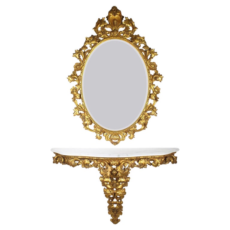 Italian Florentine Gilt Wood Carved Oval Mirror and Marble Top Console Set For Sale at 1stDibs