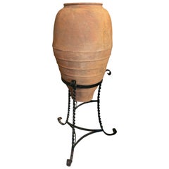 Antique Spanish Handmade Ceramic Jar with Iron Base