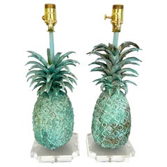 Pair of Solid Bronze Pineapples with Verdigris Finish, Lamped on Lucite Bases