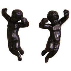 Antique Pair of 19th Century Italian Carved Blackened Wall Hanging Cherub Sculptures