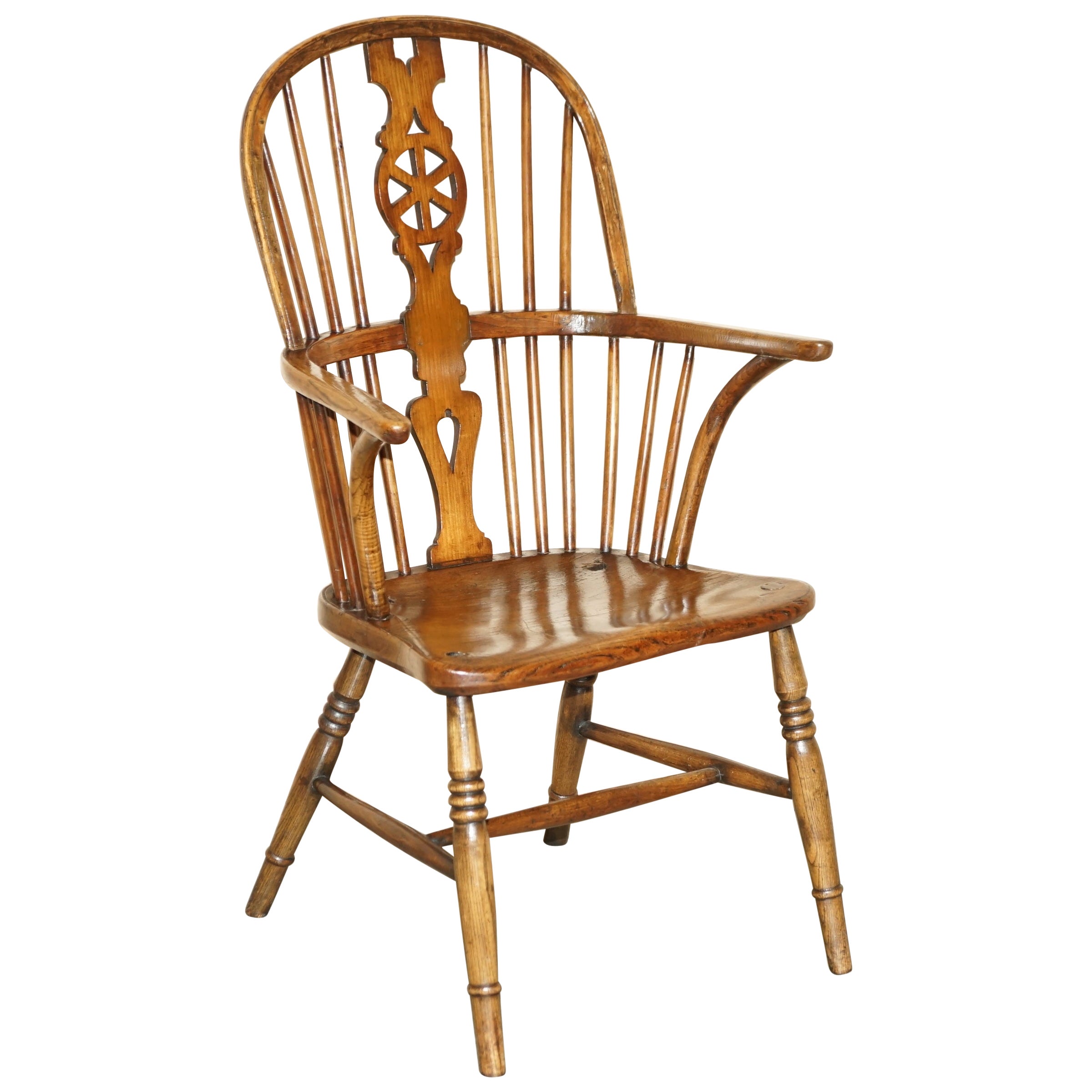 Fauteuil Windsor ancien du 19ème siècle en orme aux couleurs riches, dossier à roue, West Country en vente