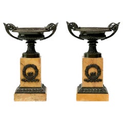 Pair of French Neoclassical Patinated Bronze Sienna Marble Mounted Mantel Urns