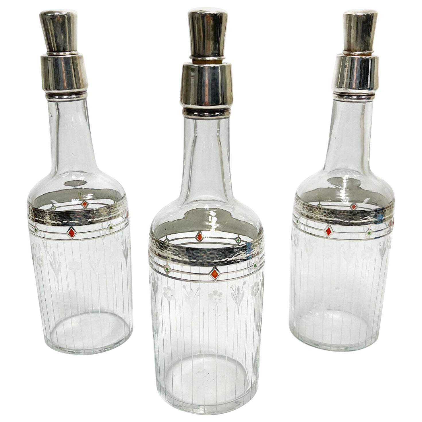 3 Art Deco American Hand Hammered Hammered Silver and Enamel Wine Bottles, c1920 For Sale