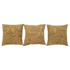 A Set of Three Decorative Vintage Floro-Geometric Double-Sided Fabric Pillows