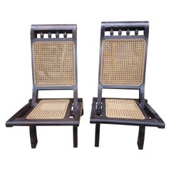 1920s, Pair of Rosewood Cane Seat Folding Lounge Chairs