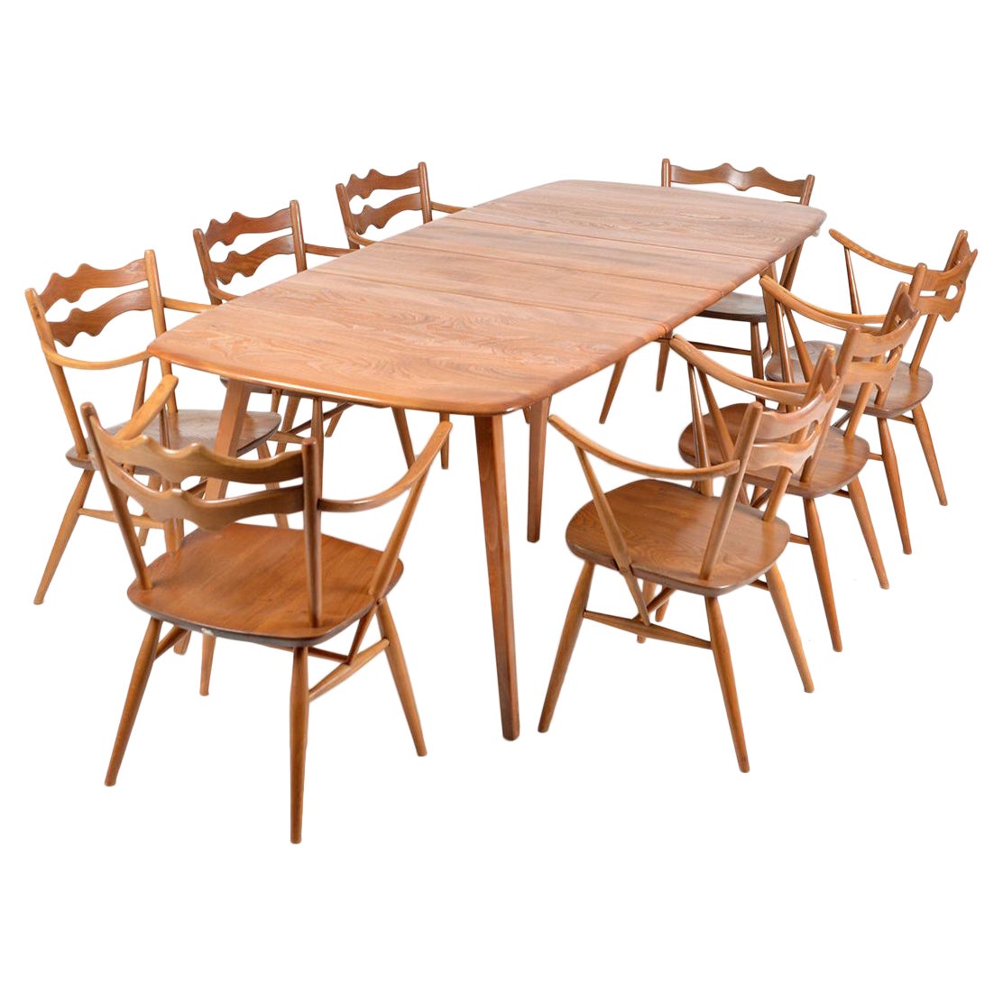 Ercol ensemble de 8 fauteuils de salle à manger Windsor des années 1960 493 et grande table à rallonge 444