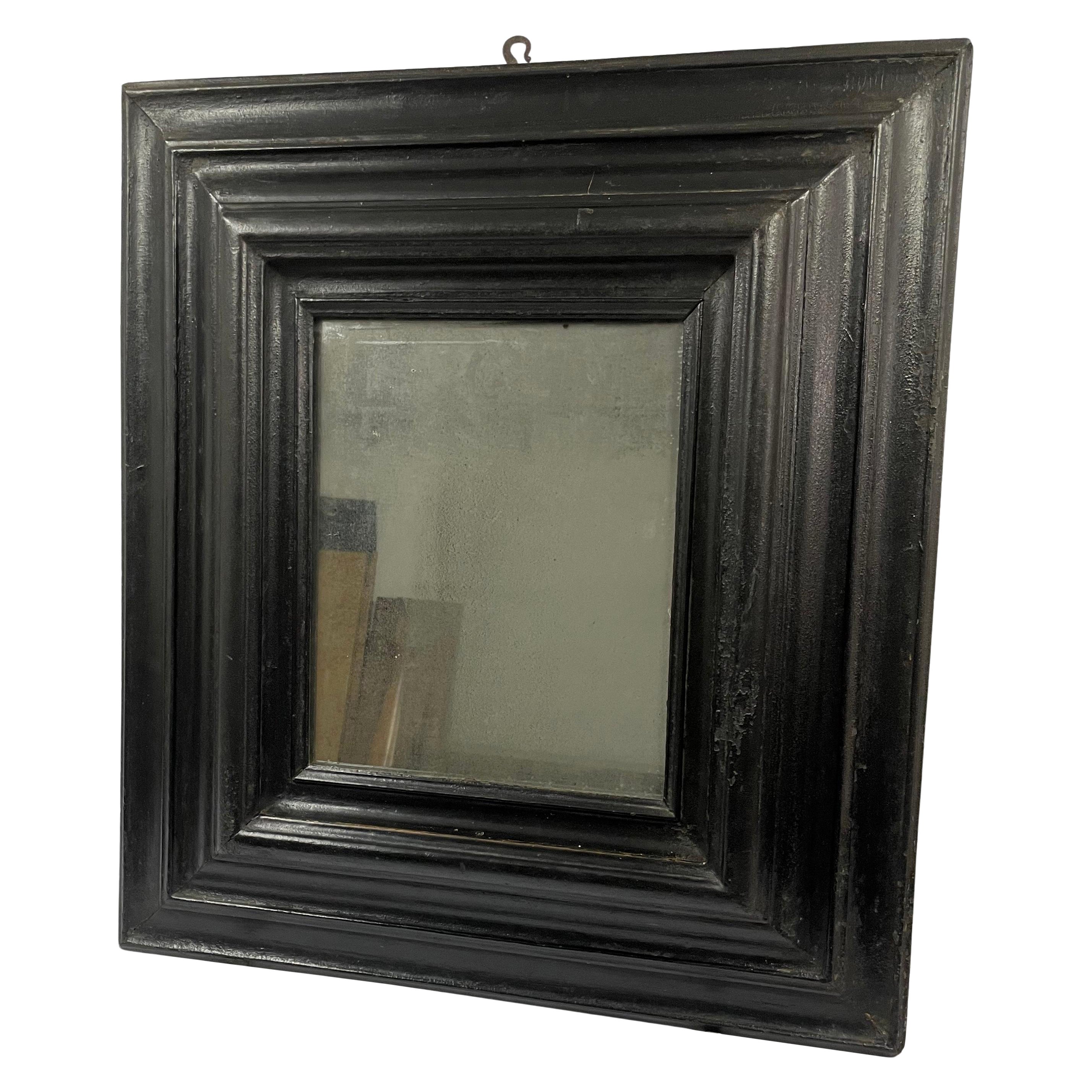 Italian Mirror in Ebonized Wood from the Early Eighteenth Century For Sale