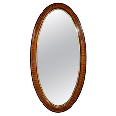 Miroir ovale étroit italien du milieu du siècle dernier avec finition en faux bois et ébène