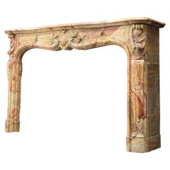 Louis XV Fireplace in Sarrancolin Marble, Early XIXth Century