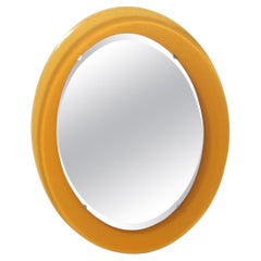 Oval Beveled Wall Mirror with Orange Glass Frame in the Style of Fontana Arte
