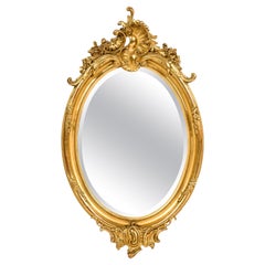 Antique Late 19th Century French Oval Gold Gilded Louis Quinze or Rococo Mirror