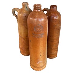 Set of Antique Stoneware Gin Bottles