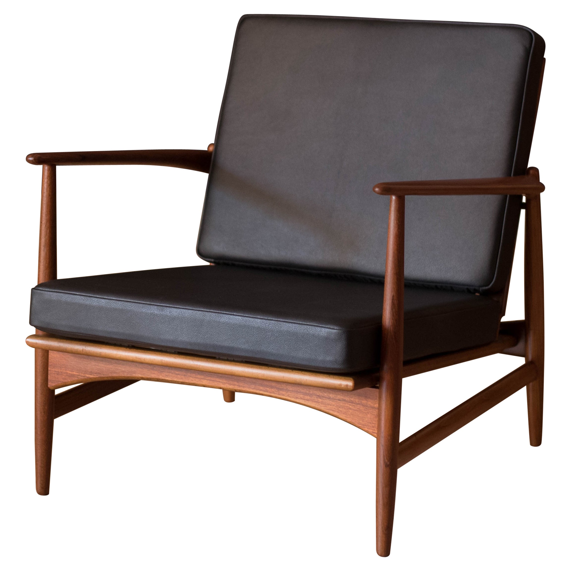 Danish Modern Teak and Black Leather Lounge Chair by Ib Kofod-Larsen for Selig