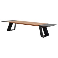 Tecta dining table made of lava stone, solid wood and steel by CMX
