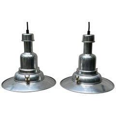 Vintage Pair of Mid Century Streamline Industrial Aluminum Pendant Lights
