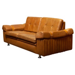 1970s Scandinavian Brutalist Two-Seater Low-Back Sofa in Camel Colored Leather