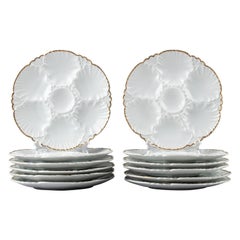 Ensemble de 12 assiettes à huîtres en porcelaine fabriquées par Cerabel