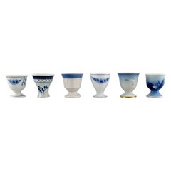 Royal Copenhagen, Bing & Grøndahl and Aluminia. Six egg cups in porcelain.