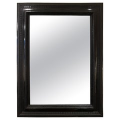 Flemish Style Ebonised Ripple Frame Mirror
