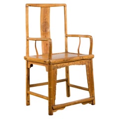Qing Dynasty 19th Century Elmwood Armchair with Hand-Carved Medallion
