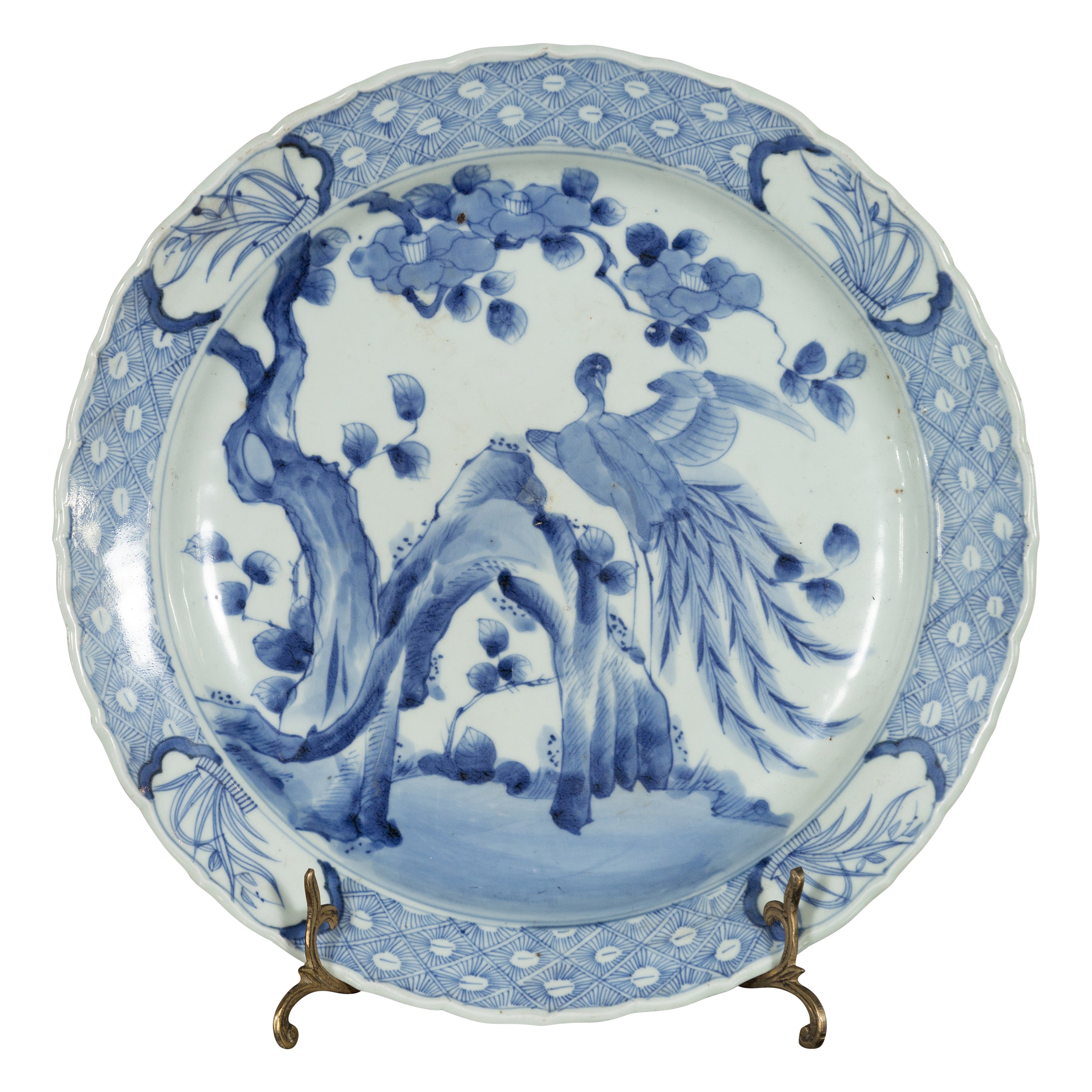 Assiette en porcelaine japonaise du 19e siècle avec décor d'oiseaux peints en bleu et blanc