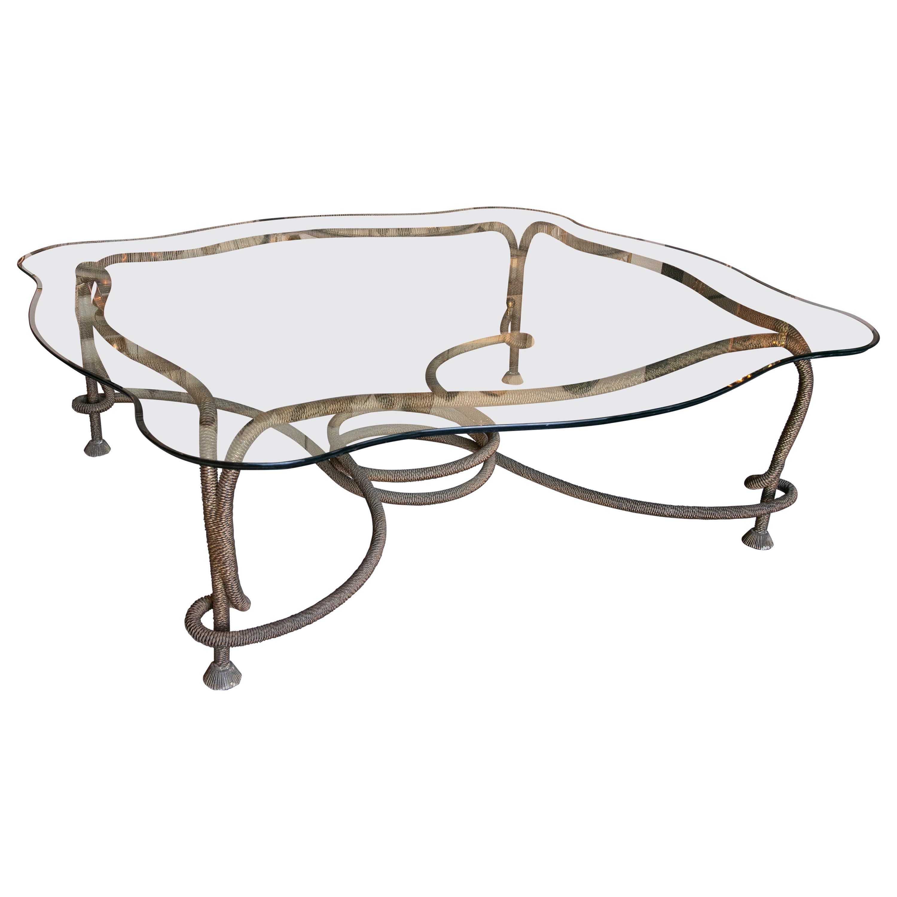 1970s Spanish Coffee Table in Bronze in the Shape of a Cordon with Glass Top