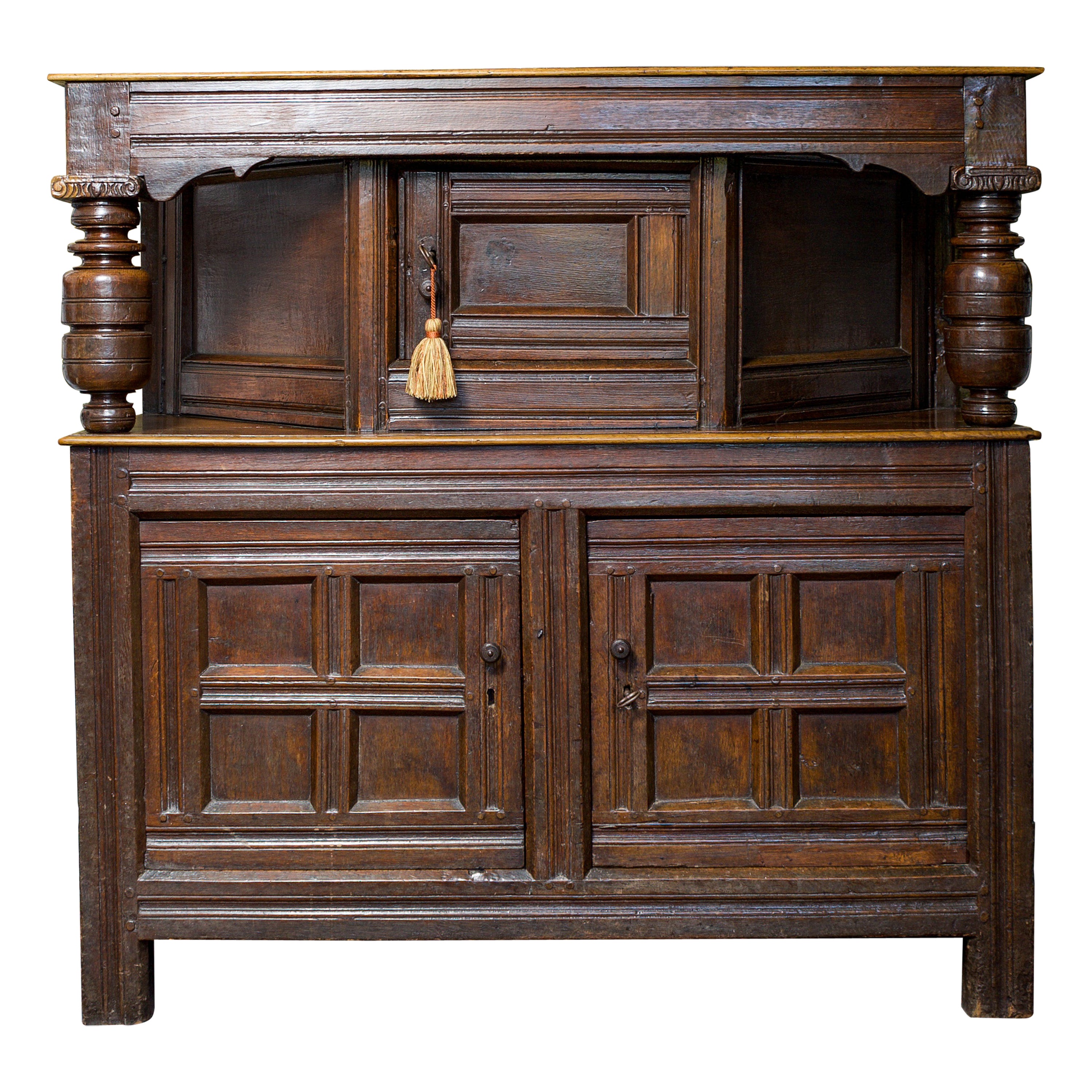 17th Century, Charles II, Canted Oak Livery Cupboard, England, Circa 1660 For Sale