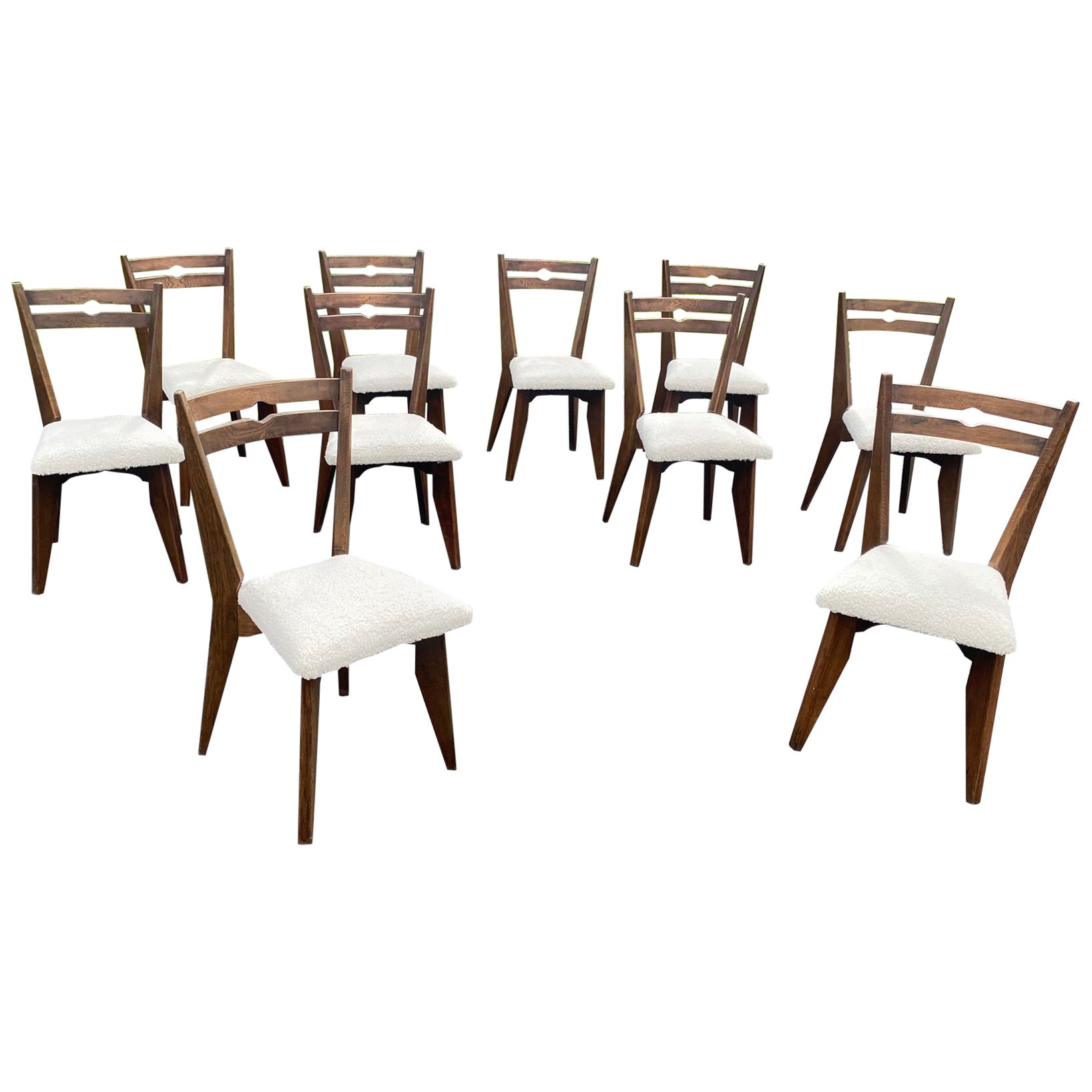 Guillerme et Chambron, set of ten oak chairs. Edition Votre Maison, circa 1970. For Sale