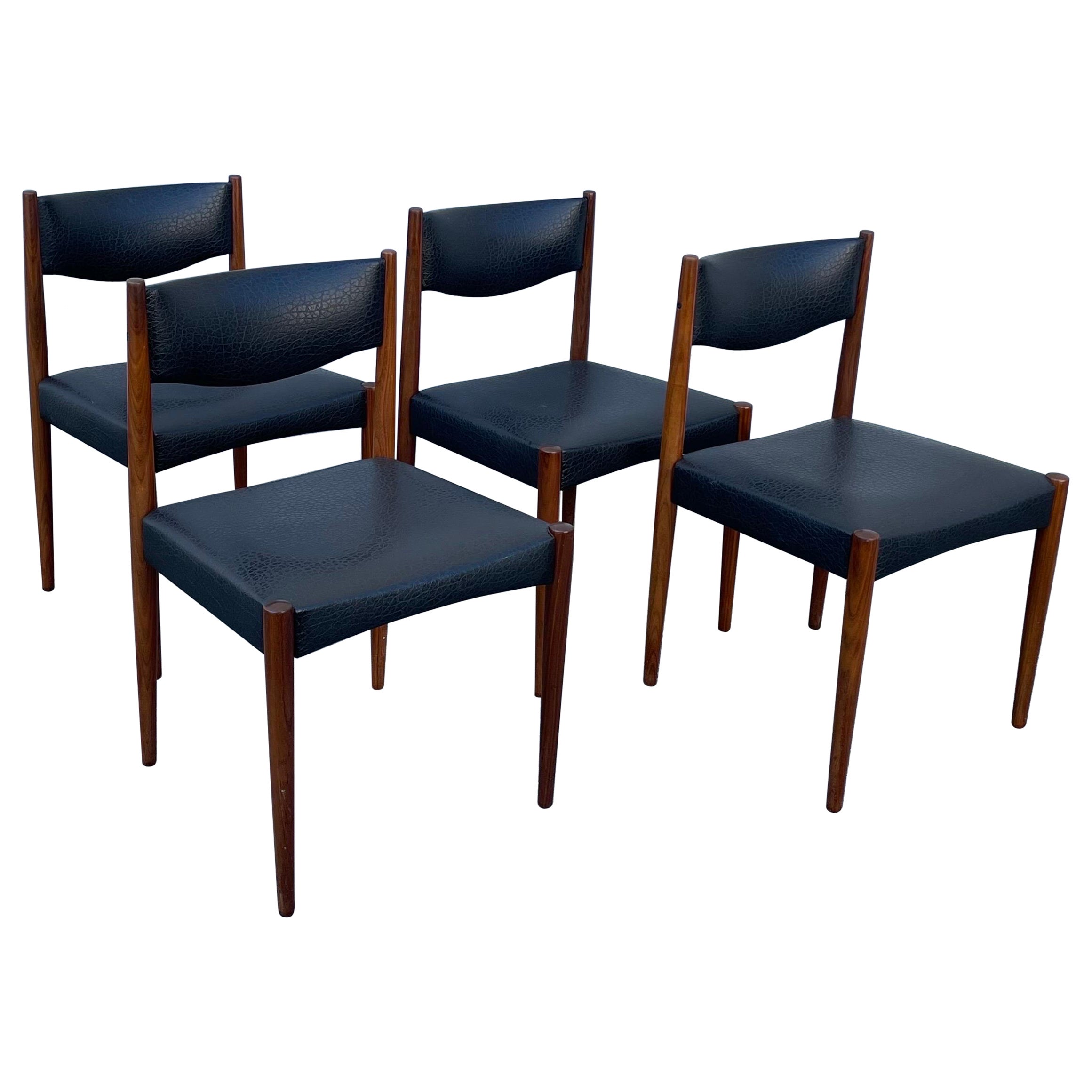 Set of Four Mid-Century Modern Teak Dining Chairs, Faux Black Leather Seats For Sale