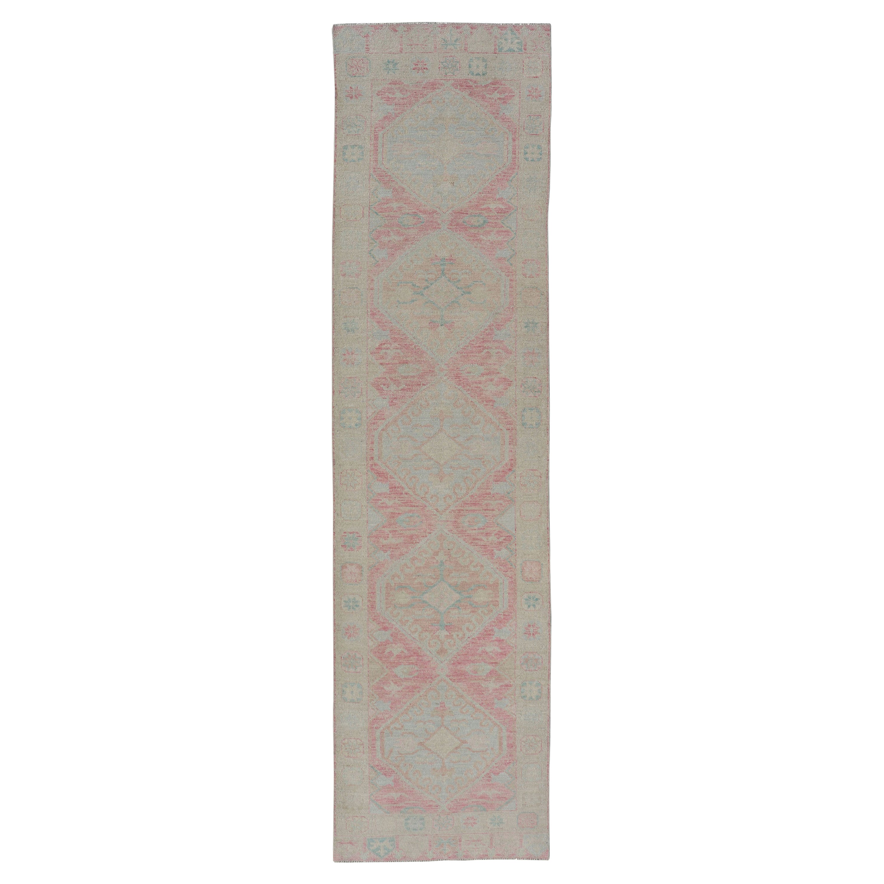 Modern Hand Knotted Oushak Runner With Medallions in Pink's and Creams For Sale