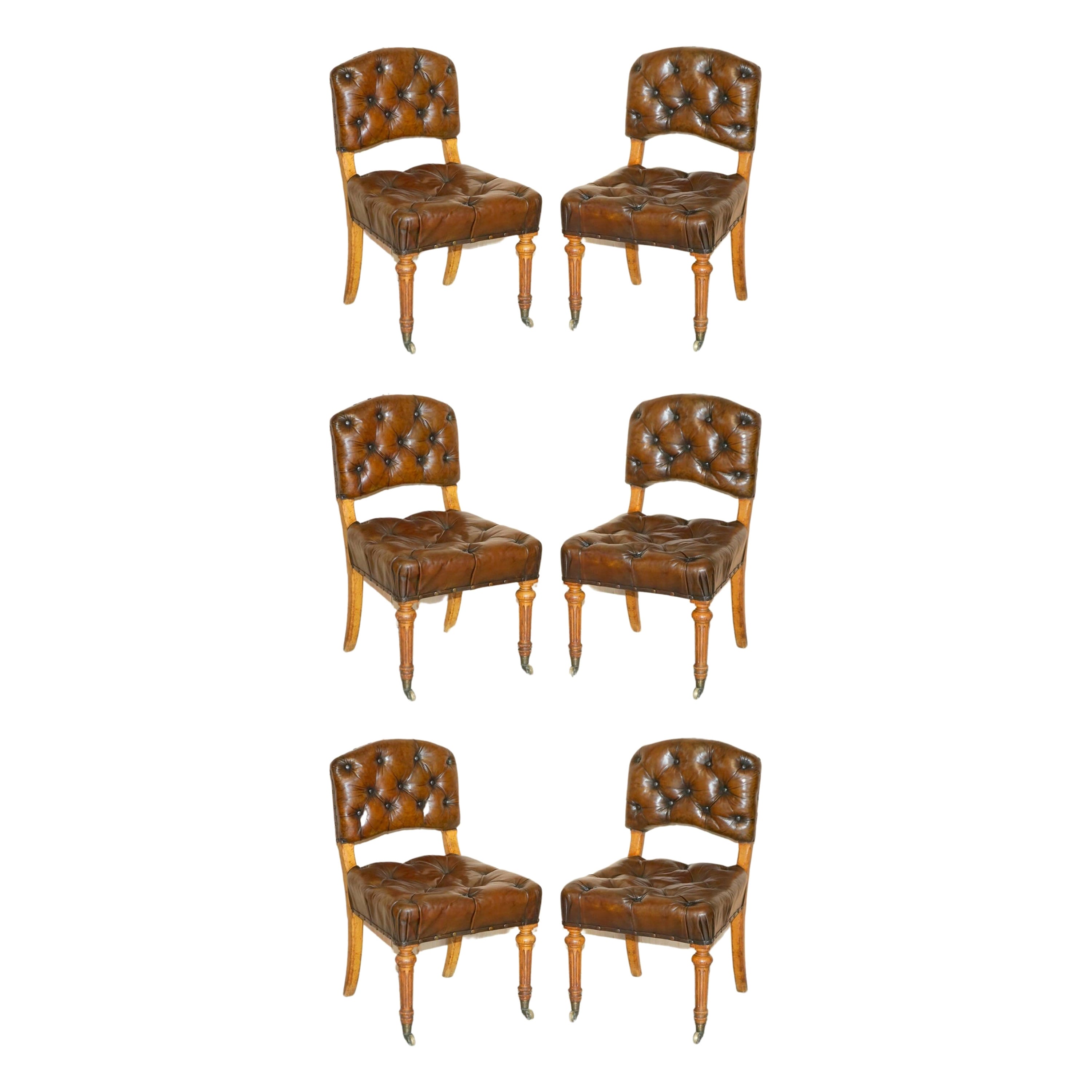 Six importantes chaises de salle à manger de style Regency anciennes en cuir Pollard et chêne de Chesterfield en vente