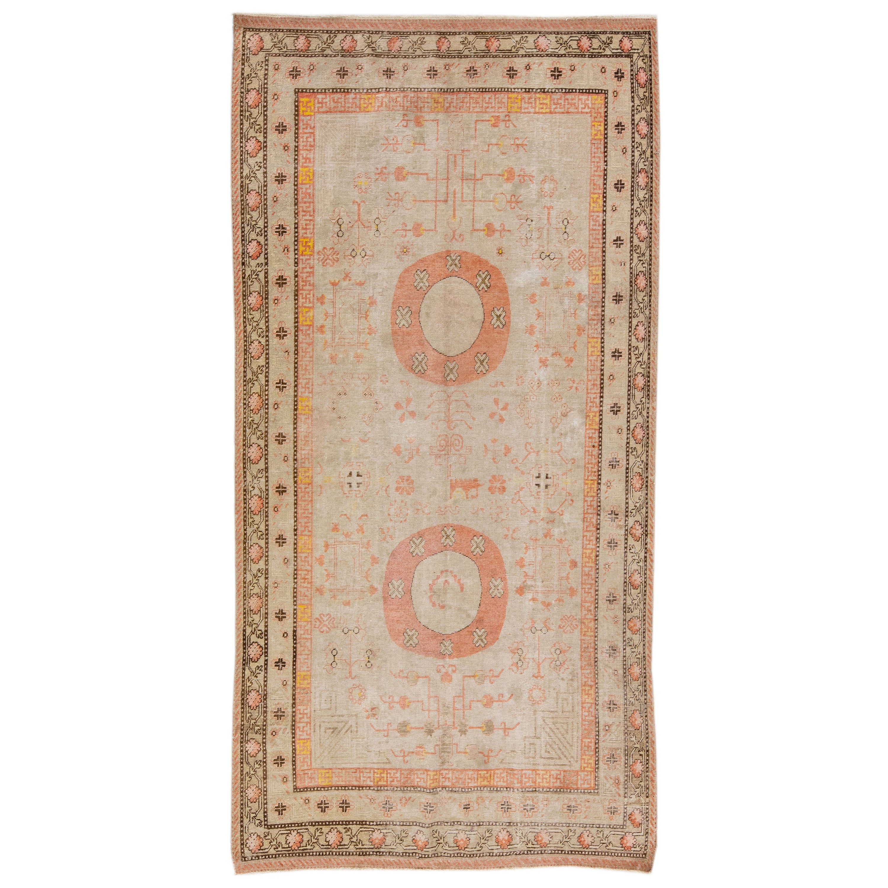 Antique Khotan Handmade Peach Persian Wool Rug With Allover Design For Sale