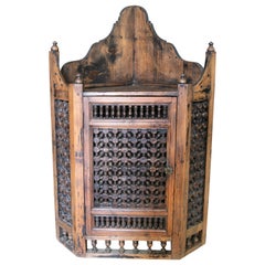 Hand-Carved Wooden Corner with One Door