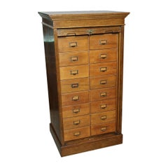 Oak filing cabinet with 16 drawers