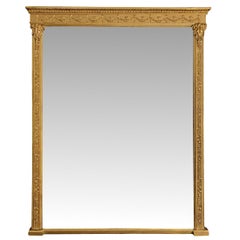 Fabuleux miroir surmonté d'un manteau en bois doré du 19ème siècle d'après Adams