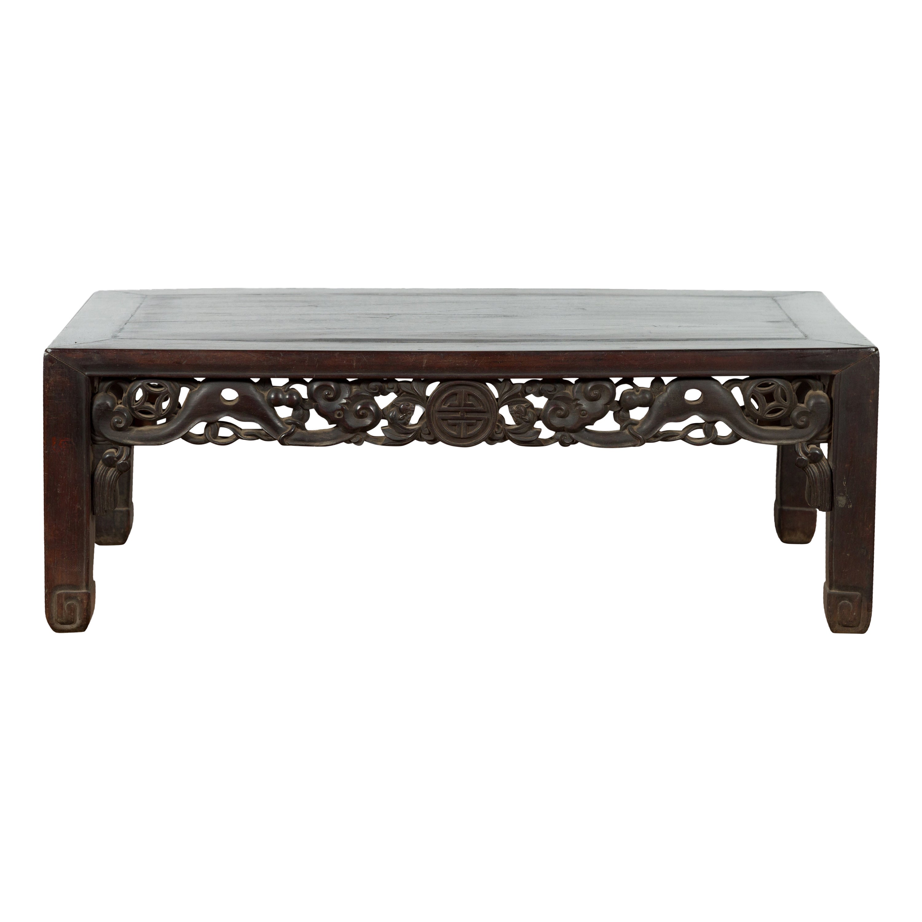 Chinese Qing Dynasty 19th Century Coffee Table with Carved Apron and Dark Patina For Sale