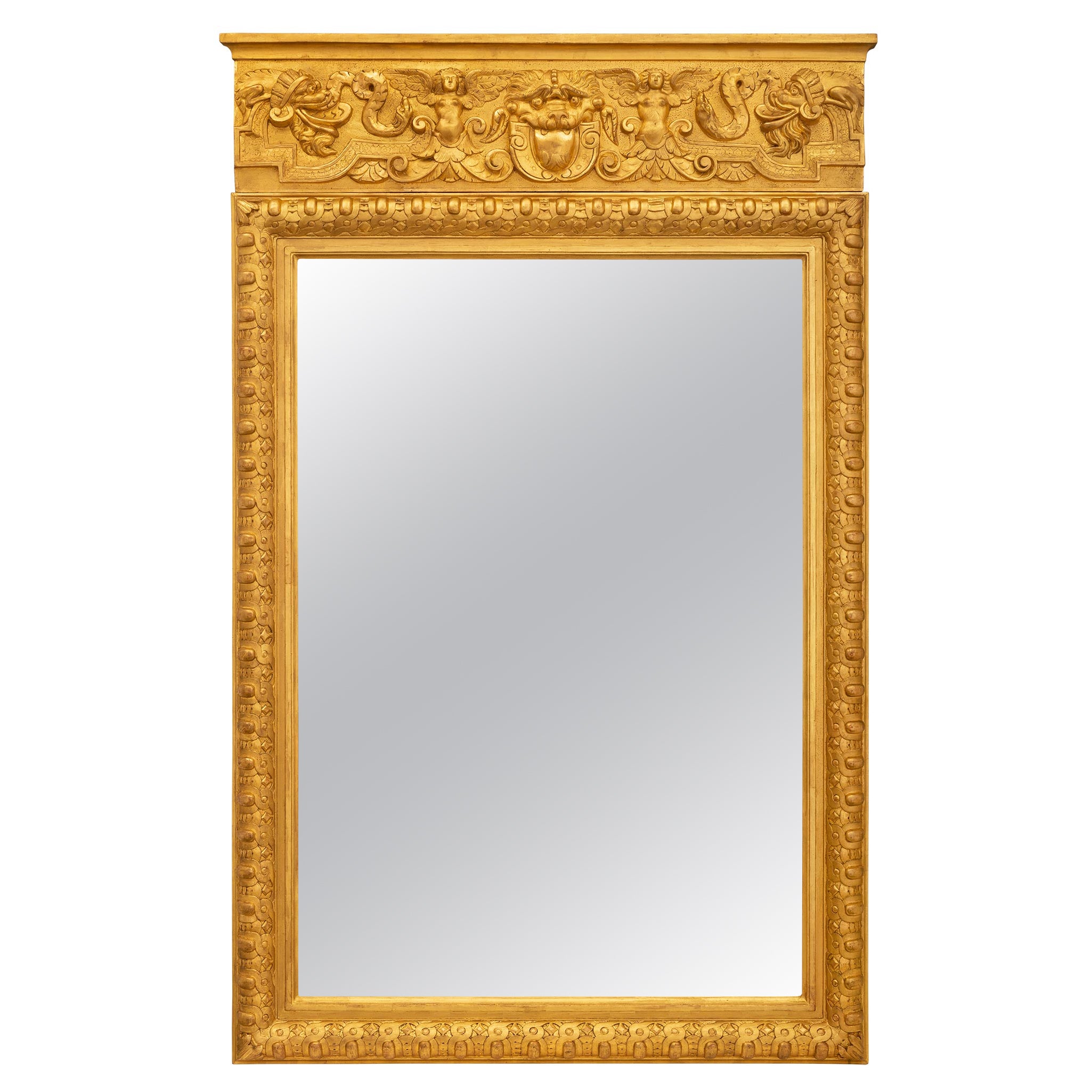 Miroir italien néoclassique du 19ème siècle en bois doré en vente