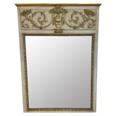 Miroir Trumeau de style Louis XVI en ivoire et doré