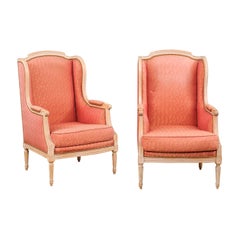 Paar französische Bergères-Stühle im Louis-XVI-Stil aus der Zeit um 1900, bemalt und gepolstert