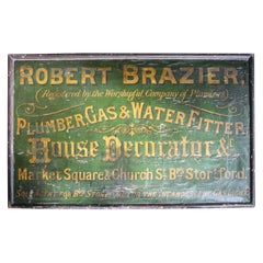 Grande plaque de magasin victorienne verte et dorée du 19ème siècle « Robert Brazier » représentant un récipient