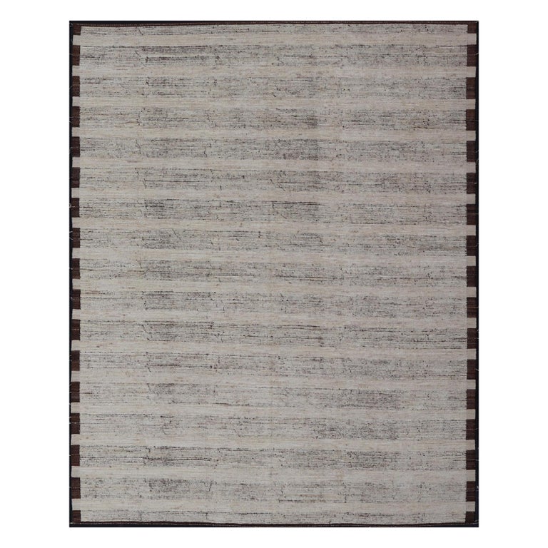 Minimalist large modern rug in ivory pile and brown color foundation