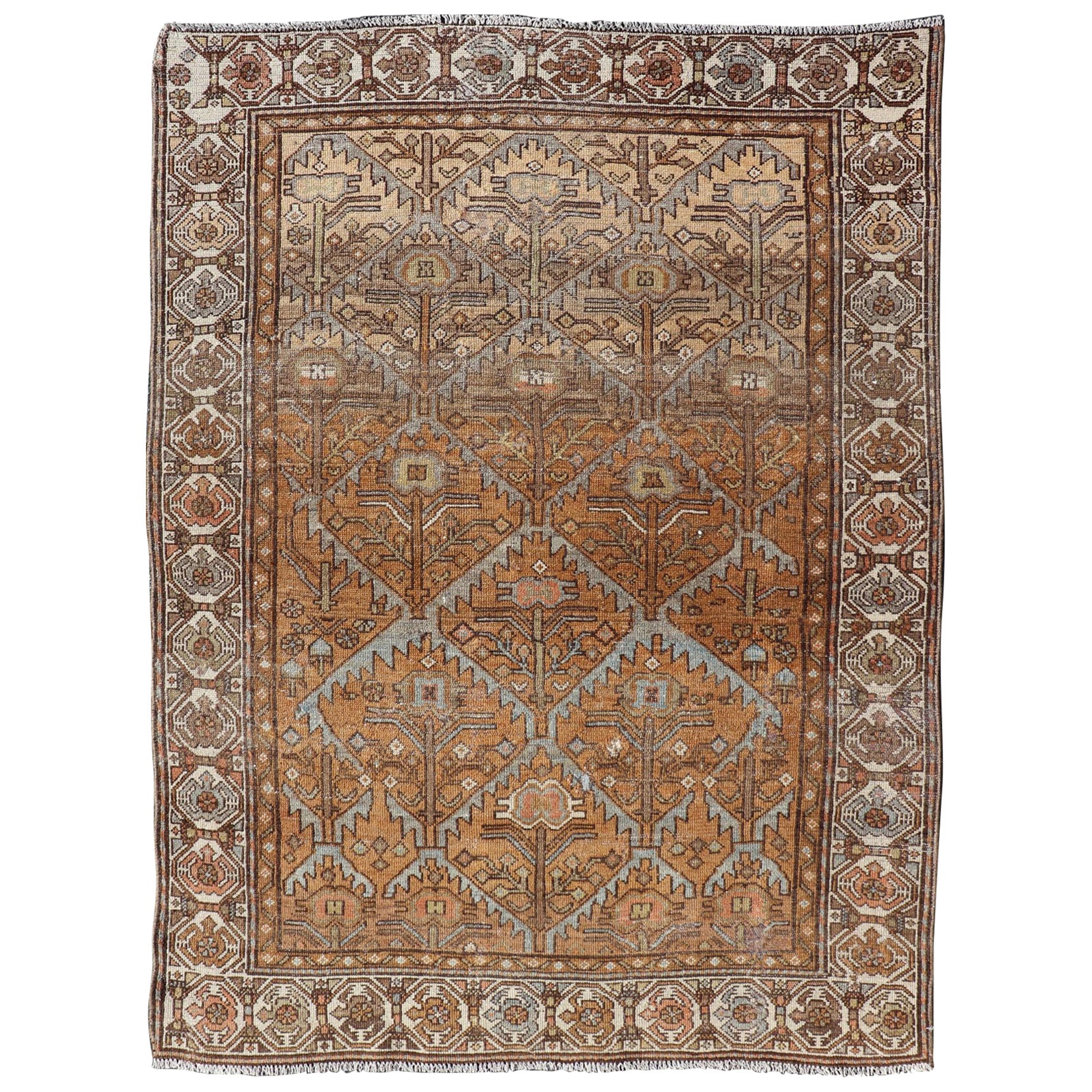 Antique Persian Malayer in Rustic Earthy Tones With All-Over Tribal Medallions