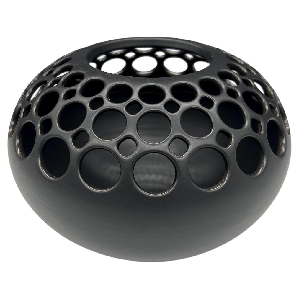 Demi-Pierced Ceramic Orb with Black Satin Glaze For Sale